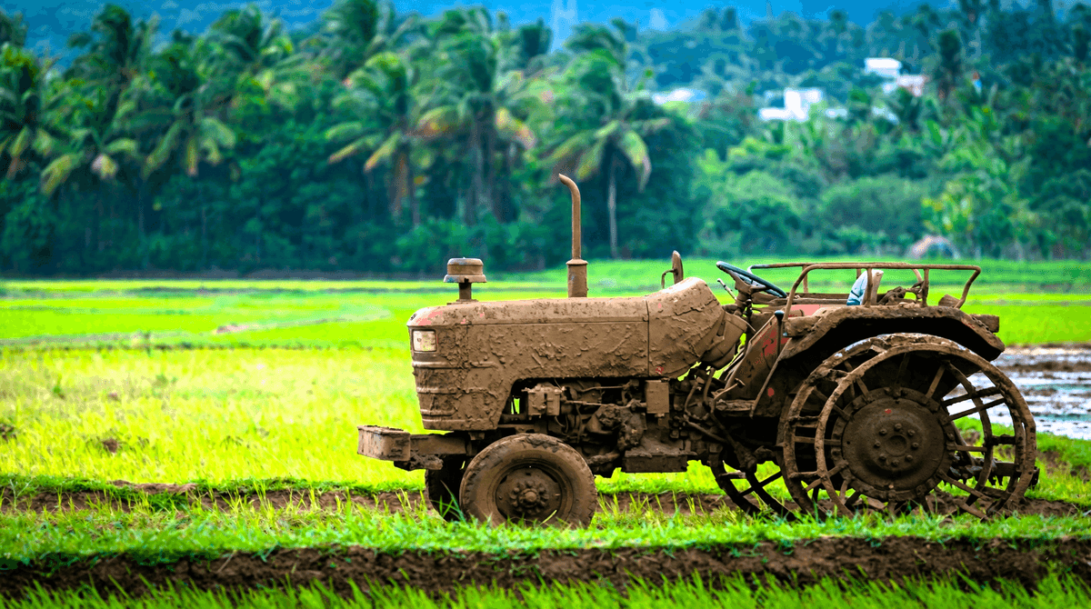 Farmer using advanced agricultural machinery in field